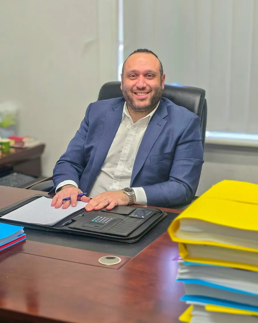 Fred Kalouche, Principal Solicitor, at his desk